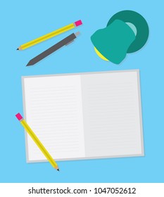 flat design of top view book, pen, study lamp in blue table background