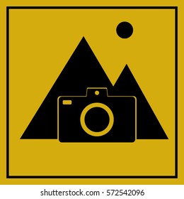 Flat design travel icon. Retro camera with mountains. Minimal design. Vector illustration
