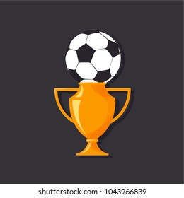 Flat design of trophy cup with soccer ball. Award icon isolated on white background. Golden vinner’s cup. Champion concept. A feather in one's cap. Vector illustration. 