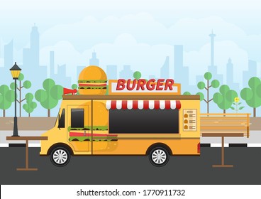 Flat design vector illustration of burger fast food van on park