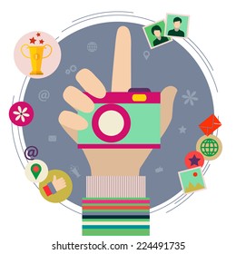  Flat design vector illustration. Human hand with photo camera and interface icons