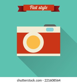  Flat design vector illustration with photo camera icon.