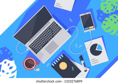 Flat desktop top view with laptop, tea, notebook, mobile phone and diagram. Concept workplace, workspace with special equipment for freelance. Vector illustration.