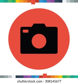 Flat DSLR camera icon in a circle.