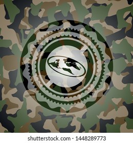 flat earth icon inside camouflage emblem