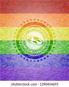 flat earth icon inside emblem on mosaic background with the colors of the LGBT flag