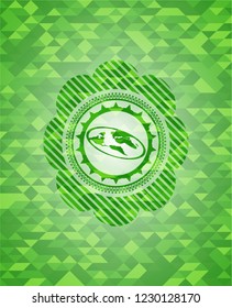 flat earth icon inside green mosaic emblem