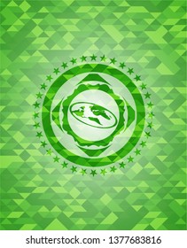 flat earth icon inside green emblem with mosaic ecological style background