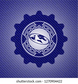 flat earth icon inside jean or denim emblem or badge background