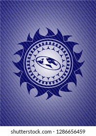 flat earth icon inside jean or denim emblem or badge background