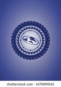 flat earth icon inside jean or denim emblem or badge background