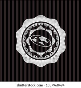 flat earth icon inside silvery emblem