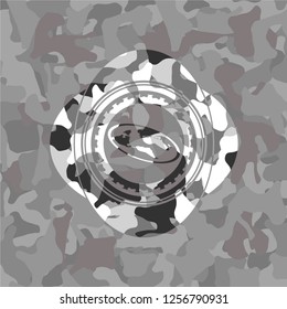 flat earth icon on grey camouflage texture