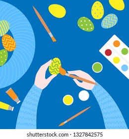 Flat Easter paint class. Top view of art equipment colors, brush and palette on a table. Creative Eggs painting Workshop. Cartoon greeting card and postcard