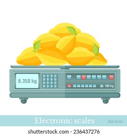 flat electronic balance or scales with lemons