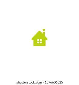 Flat green home with heart. Simple silhouette of the house with roof and chimney. Icon isolated on white. Vector building symbol. friendly house. Home sweet home