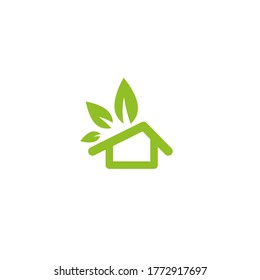Flat green home with green leaves roof. Simple silhouette of the house with green roof and chimney. Icon isolated on white. Vector building symbol. Eco friendly house. recycle and reuse home sign.