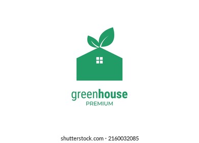 Plantilla vectorial de diseño de logotipo de casa verde plana