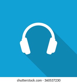 Flat Headphones icon with long shadow on blue backround