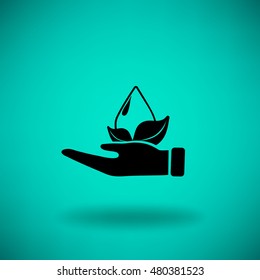Flat icon. A drop of water on a leaf. On the palm.