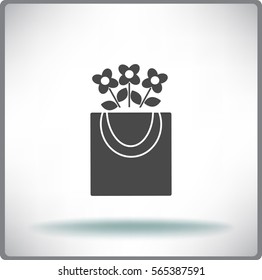 Flat icon. Flowers in a shopping bag.