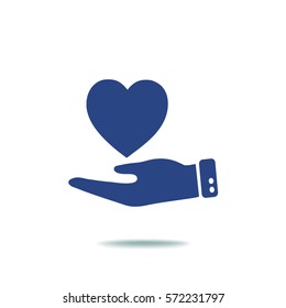 Flat icon. Heart on hand.