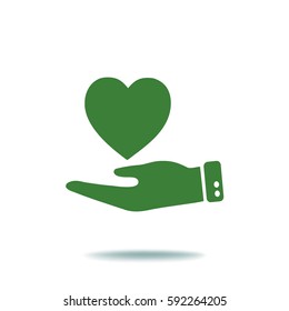 Icono plano. Corazón a mano.
