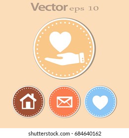 Icono plano. Corazón a mano.