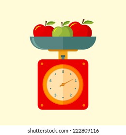 Flat icon kitchen scales with red and green apples