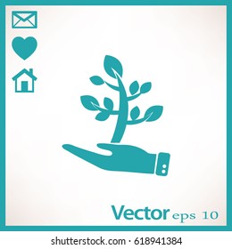 Flat icon. The plant is in the palm of a person. In human hands the fate of the plant world.