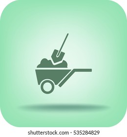 Flat icon. Shovel in a garden wheelbarrow.