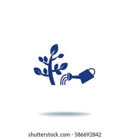 The flat icon. Watering plants. Water pouring from a watering can on the plant.