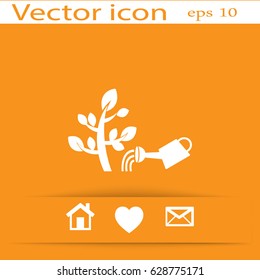The flat icon. Watering plants. Water pouring from a watering can on the plant.