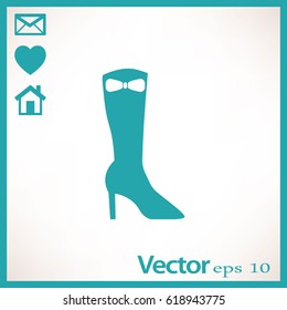 Icono plano. Botas de las mujeres