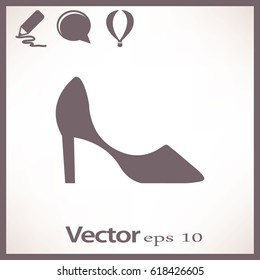 Icono plano. La zapatilla de las mujeres.