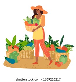 Flat illustration of a female farmer holding a wicker basket with various vegetables and standing next to many baskets of harvested vegetables. Concept of agriculture, gardening and agricultural hobby