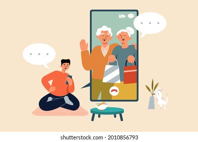 Flat illustration of a young man sitting at home talking on a video call with elderly parents, one of them holding shopping bags on hand