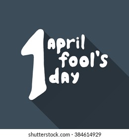 Flat inscription of fools day casting a shadow. White and dark blue