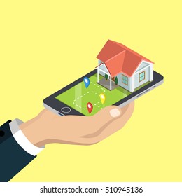 Flat isometric human hand holding smartphone with house and GEO location marks vector illustration. 3d isometry GPS, city transportation concept.