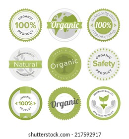 Flat label collection of 100% organic product and premium quality natural food badge elements. Flat design style modern vector illustration concept. Isolated on white background.