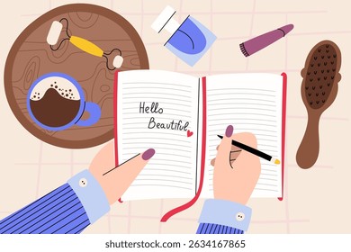 Flat lay of journaling with coffee and beauty items . Woman writing "Hello Beautiful" in a notebook, surrounded by coffee, cosmetics and self-care accessories on a cozy table setup.  