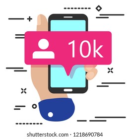 flat lay modern minimal hand holding mobile phone with new pink ten like followers social media icon  on white background