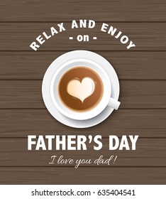 Flat lay style father`s day greeting card with cup of coffee on wooden table.