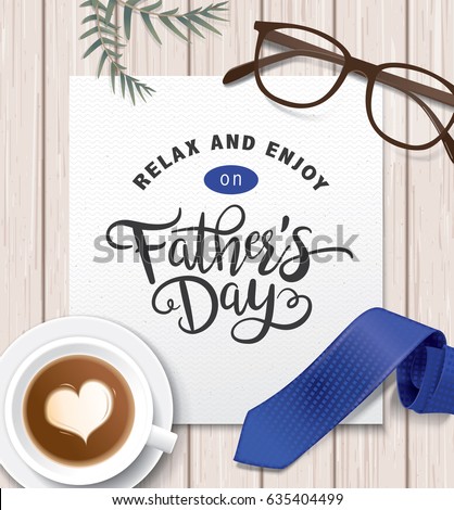 Flat lay style father`s day greeting card with cup of coffee, necktie and glasses on wooden table.