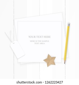 Flat lay top view elegant white composition paper tag yellow pencil and star shape craft on wooden background.