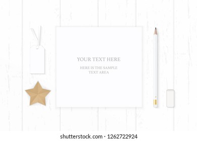 Flat lay top view elegant white composition paper pencil eraser star shape craft and cardboard tag on wooden background.