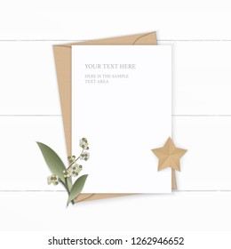 Flat lay top view elegant white composition letter kraft paper envelope flower leaf and star shape craft on wooden background.