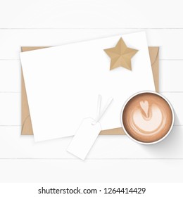 Flat lay top view elegant white composition paper kraft envelope tag star craft and coffee on wooden background.