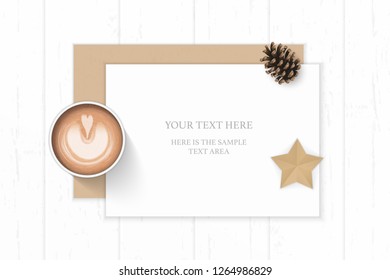 Flat lay top view elegant white composition paper kraft envelope pine cone coffee and star shape craft on wooden background.
