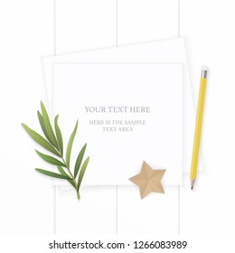 Flat lay top view elegant white composition paper tag yellow pencil tarragon leaf and star shape craft on wooden background.